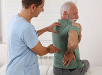 Patient displaying back pain
