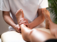 Physician working with a patients ankle