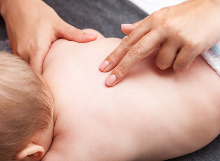 Close up of an infants back