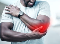 Man having elbow pain