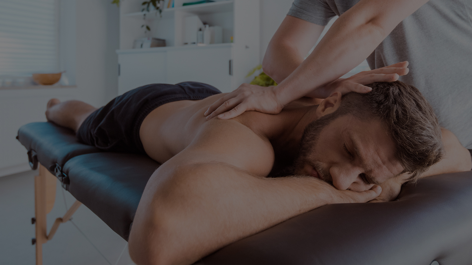 man receiving chiropractic treatment